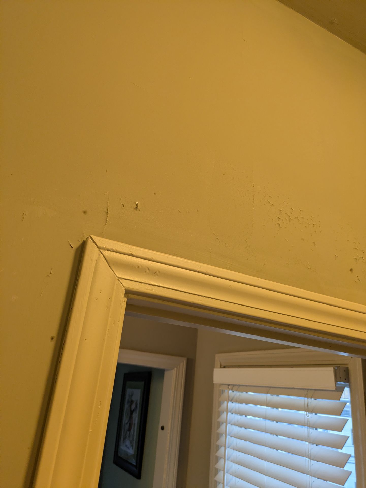 Grouting grey slate floor tiles in an Athens GA home